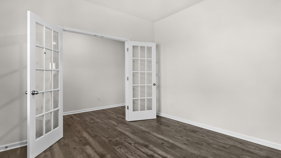 flex room with large windows, french doors