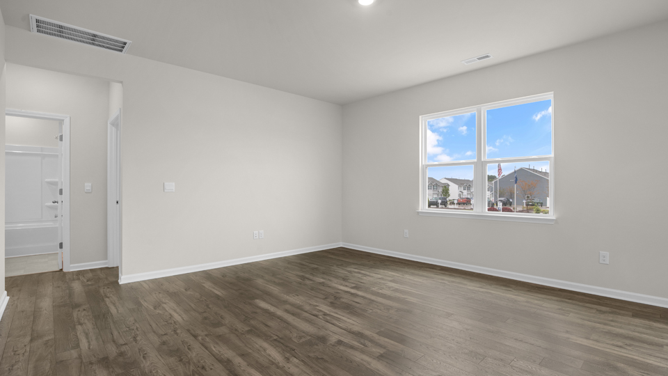 open concept living space with large windows