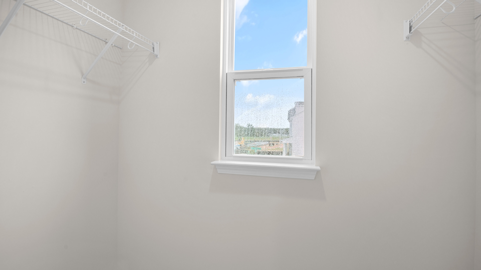walk in closet with wire shelving