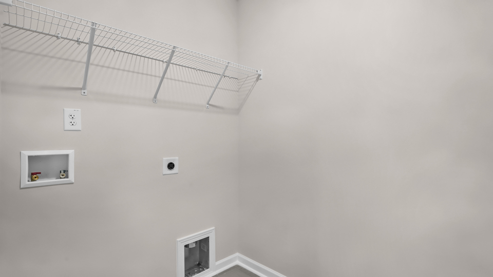 laundry room with wire shelving