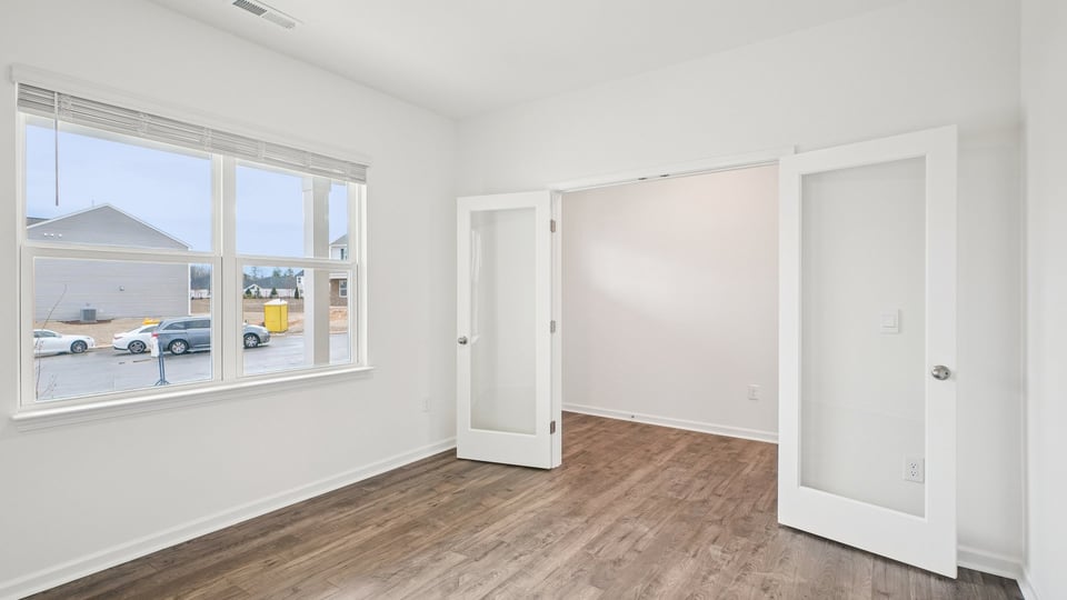 flex room with large windows, french doors