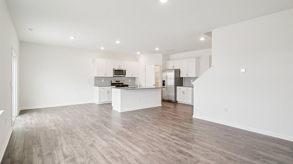 open concept living space with large windows
