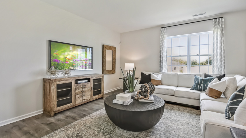 open concept living space with large windows