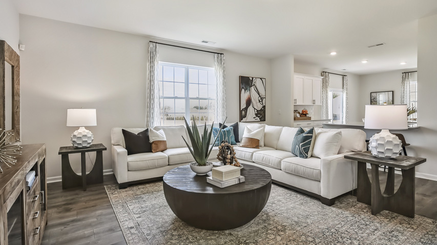 open concept living space with large windows