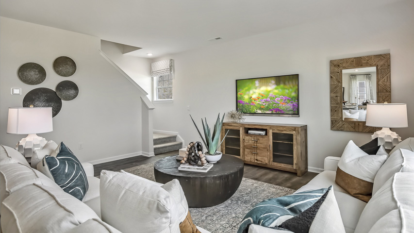 open concept living space with large windows