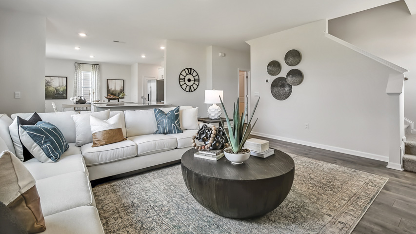 open concept living space with large windows