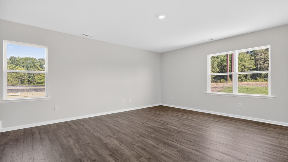 open concept living space with large windows