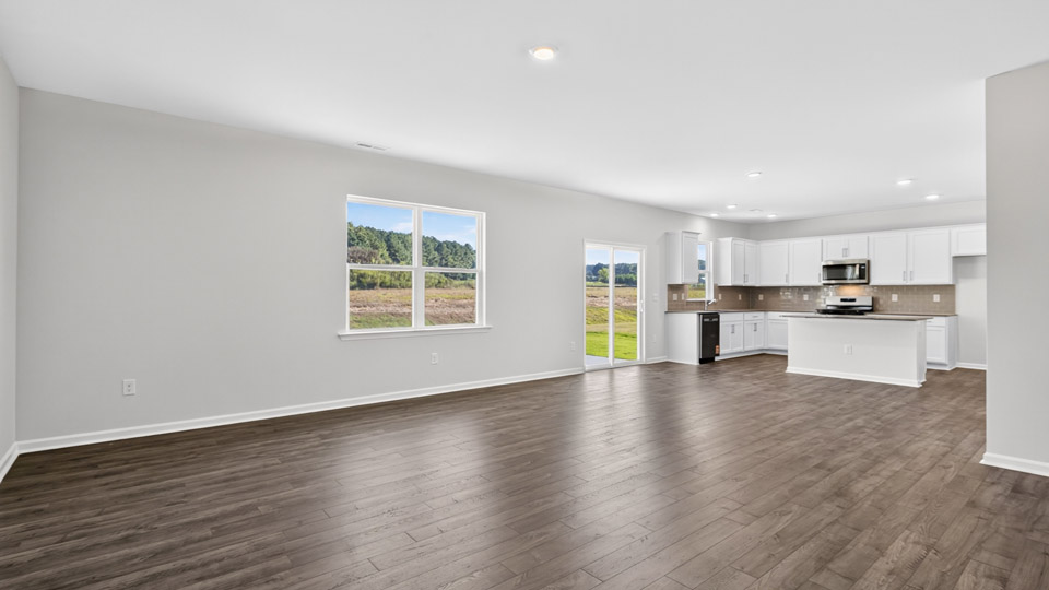 open concept living space with large windows