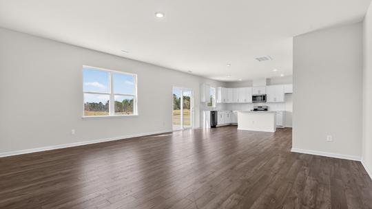 open concept living space with large windows