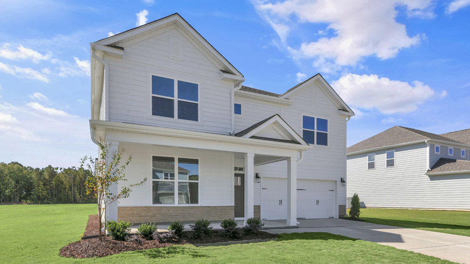 front exterior of lawson with 2 car garage