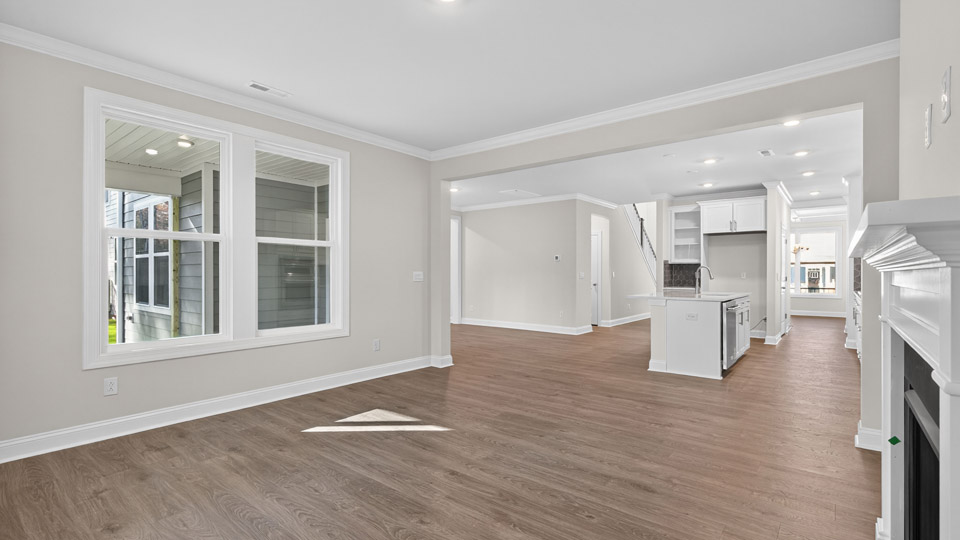 open concept living space with large windows