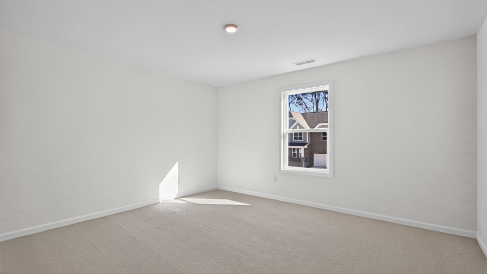 Bedroom with carpet floor and closet