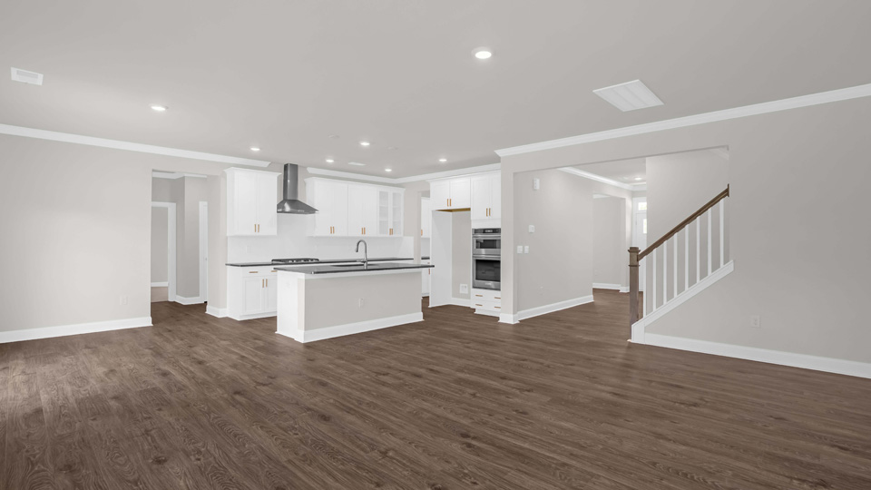 BREAKFAST AREA, KITCHEN, AND FAMILY ROOM