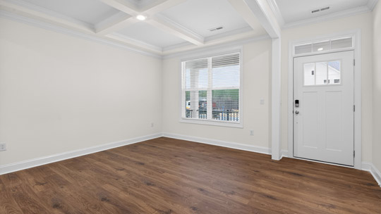 dining room with coffered ceiling