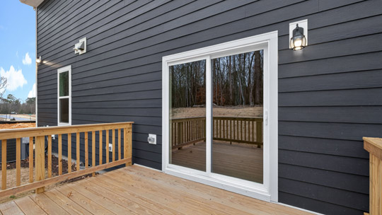 back deck with sliding glass doors