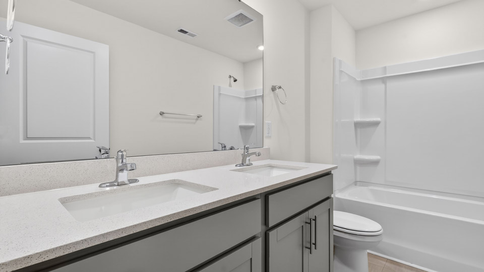 Bathroom with sink and tub