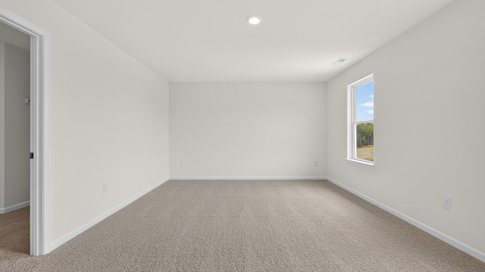 Bedroom with carpet floor and closet