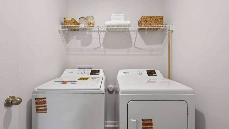 laundry room with wire shelving