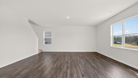 living room with revwood flooring