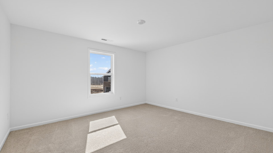 Bedroom with carpet floor and closet