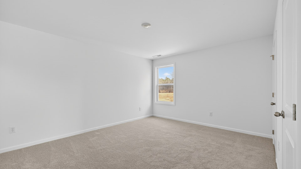 Bedroom with carpet floor and closet