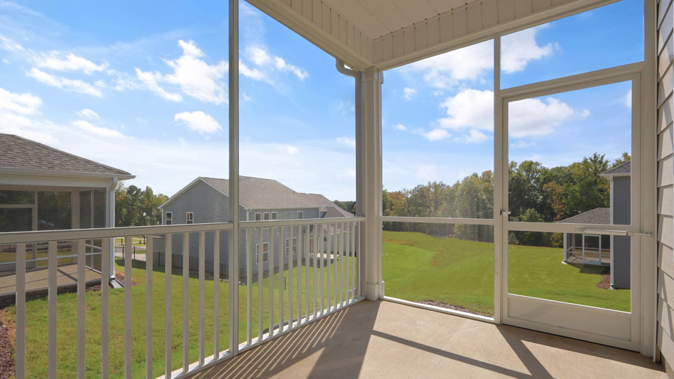covered and screened in back patio
