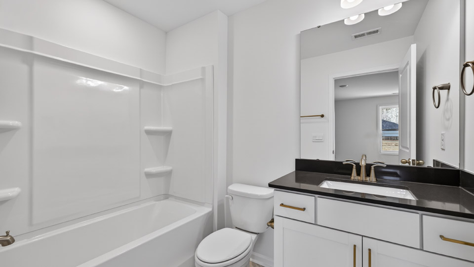 additional bathroom with single vanity sink
