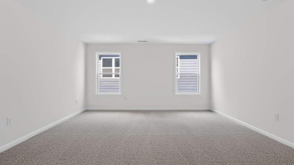loft with carpet flooring