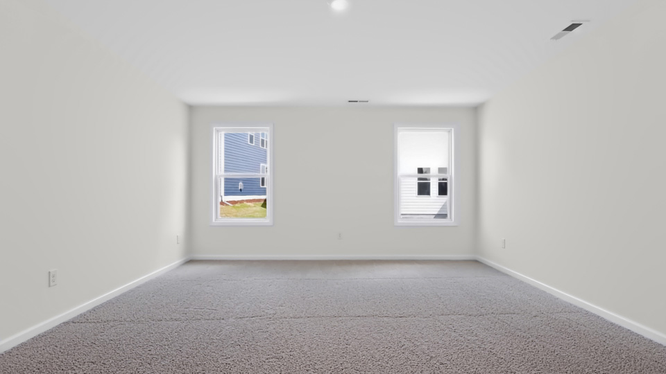loft with carpet flooring