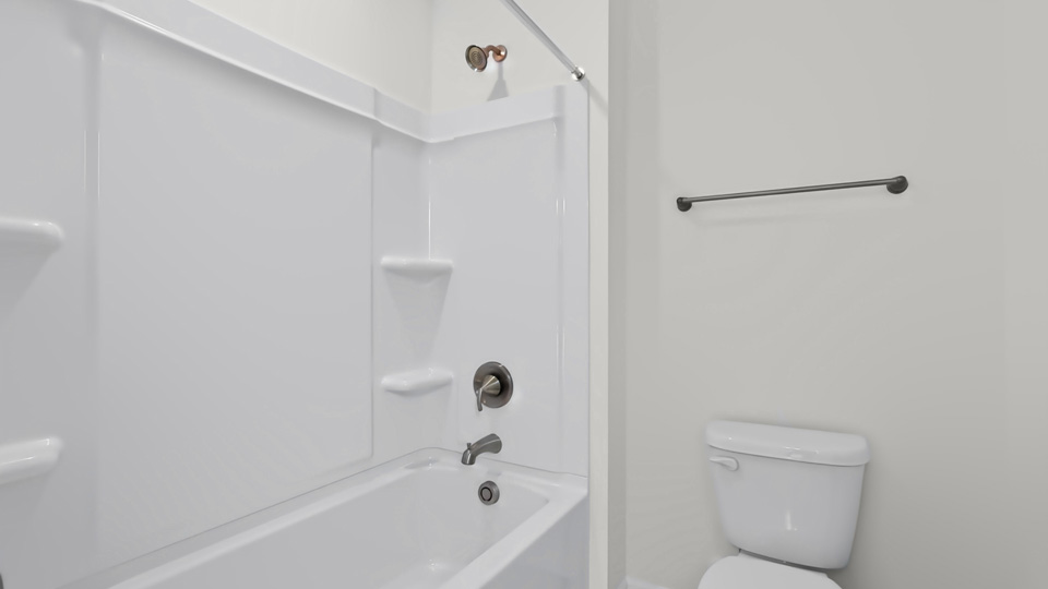 bathroom with tub shower combo