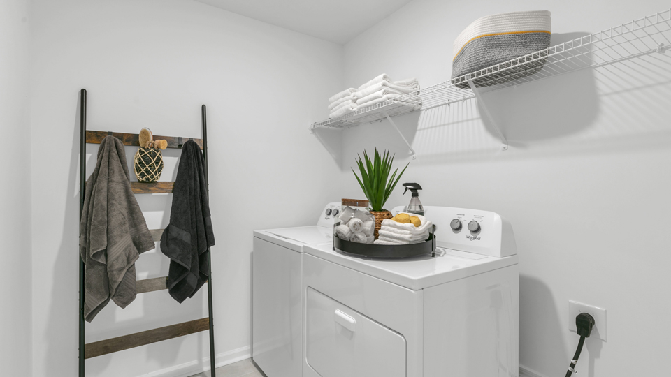laundry room with wire shelving