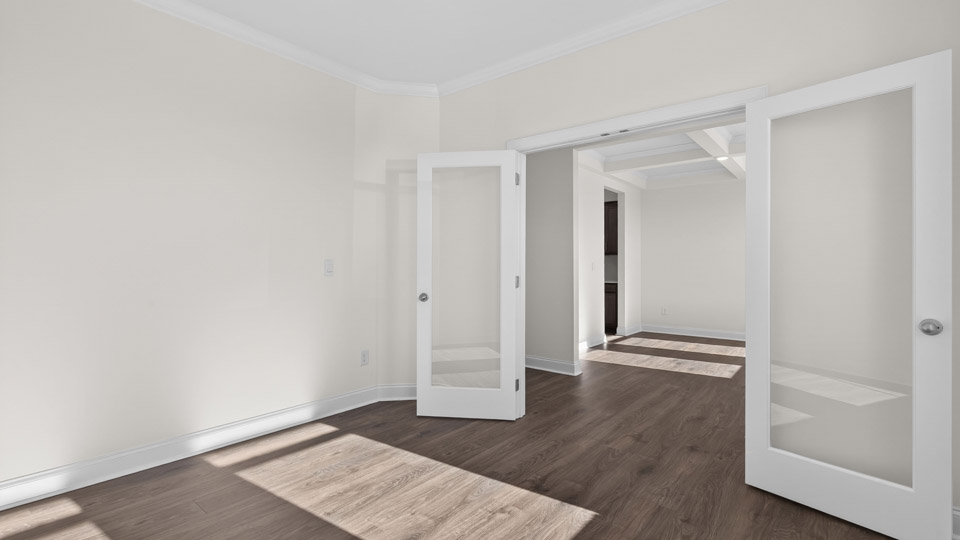Study room with hardwood floors and big windows