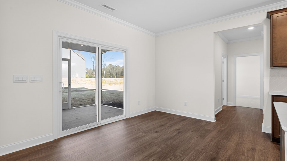 Sliding glass back door leading to back patio