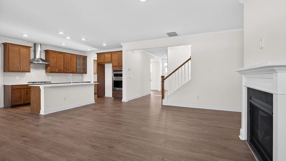 Open-concept living room area with fireplace
