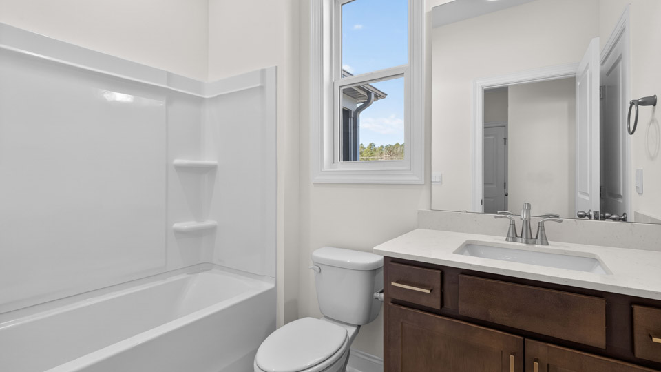 Bathroom with single sink and tub