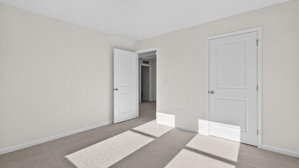 Bedroom with carpet floor and closet