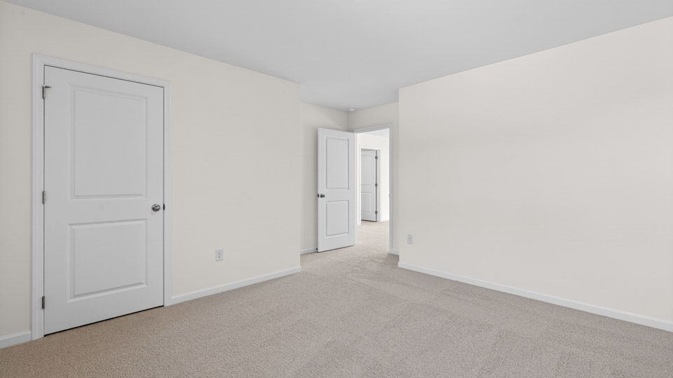 Bedroom with carpet floor and closet