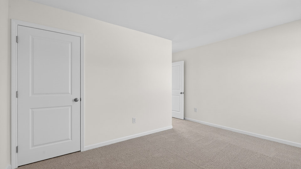 Bedroom with carpet floor and closet