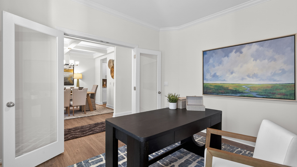 Study room with hardwood floors and big windows