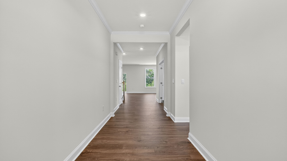 foyer entryway with revwood flooring