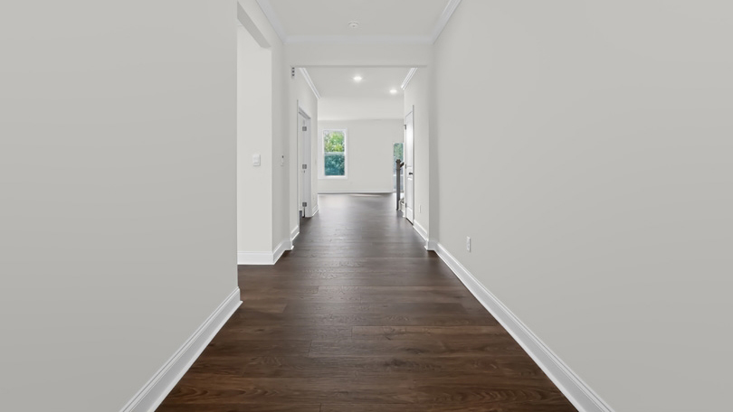 foyer entryway with revwood flooring