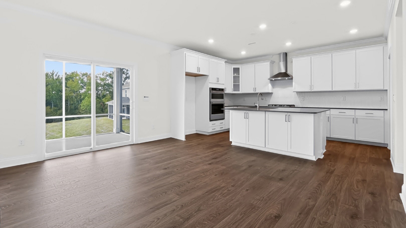 kitchen and sliding glass doors to patio