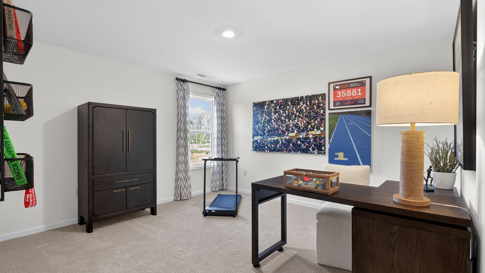 additional bedroom with window, carpeting, closet