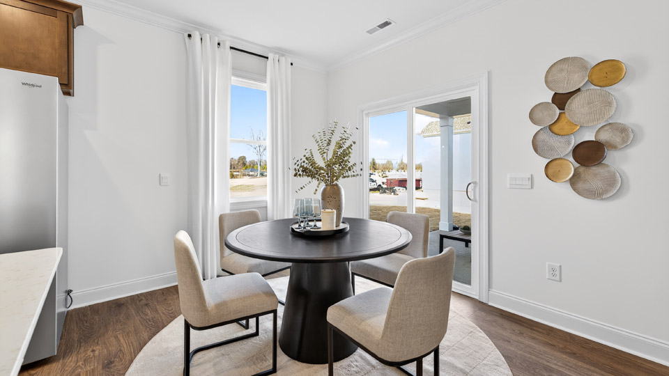 formal dining room with coffered ceilings