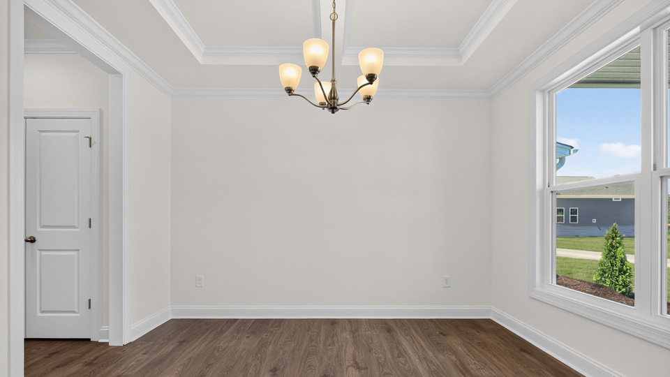dining room with coffered ceiling
