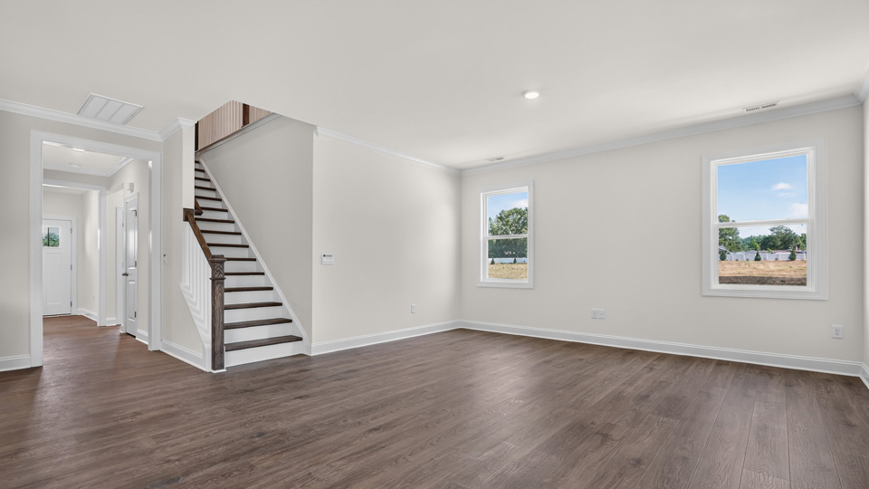 living room with revwood flooring