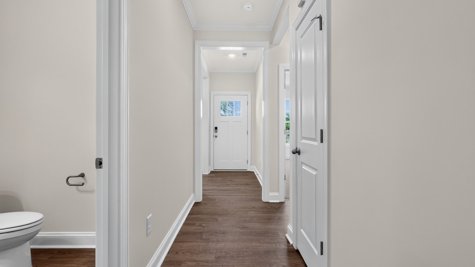 foyer entryway with revwood flooring