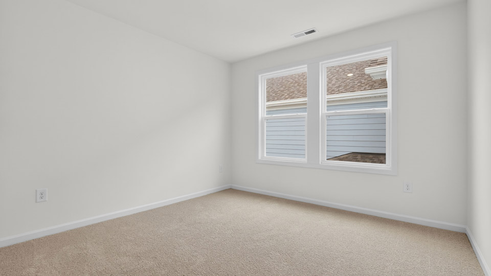 Bedroom with carpet floor and closet