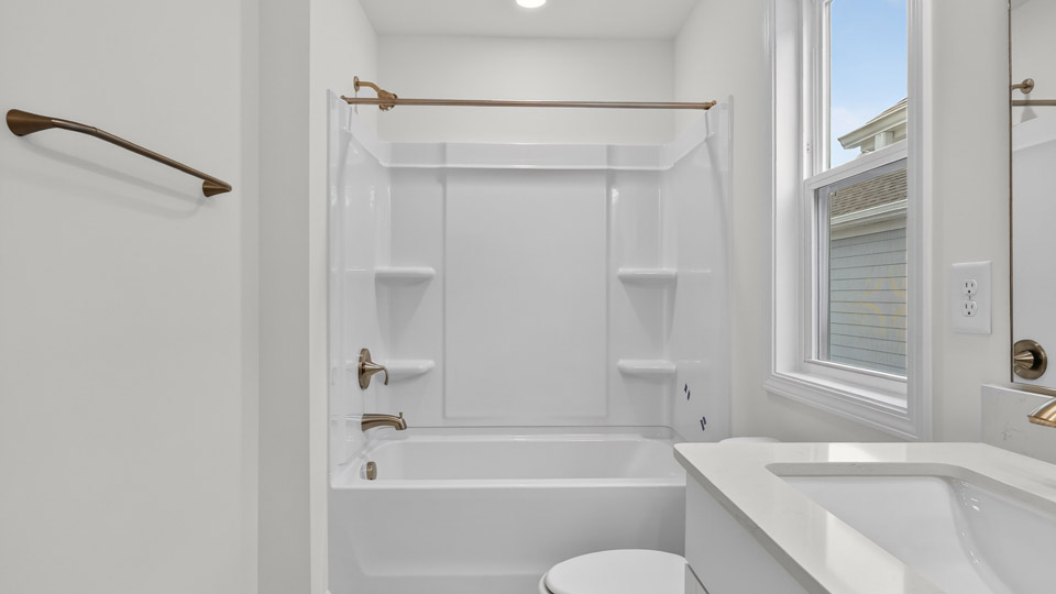 Bathroom with sink and tub