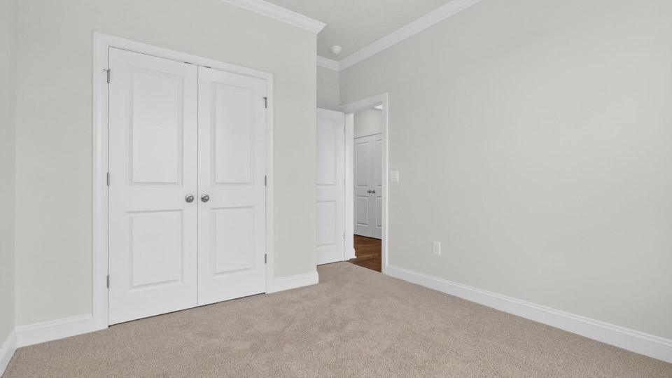 Bedroom with carpet floor and closet